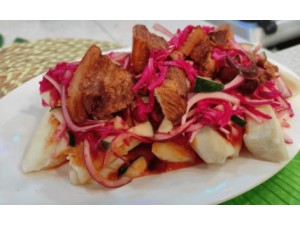 Receta Tradicional: Yuca Frita con Chicharrón